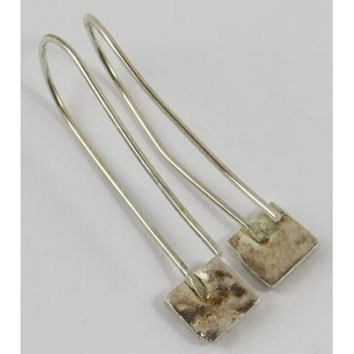 445 - A pair of Artisanal silver earrings with square pendants below long shepherds crook fittings, 4cm lo... 