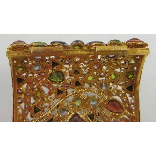 446 - A decorative 22ct gold Indian wide hinged bangle, of openwork design all over set with facet cut sem... 