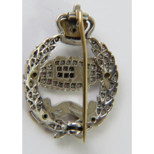 455 - Regimental interest: A fully diamond set and white gold Royal Tank Regiment sweetheart brooch with e... 