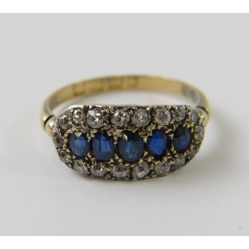 456 - An antique 18ct gold sapphire and diamond boat shaped cluster dress ring, the five graduated oval fa... 