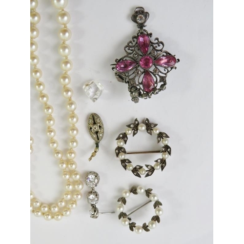 459 - Three paste brooches; and two strands or part strands of pearls, a paste earring and a small quartz ... 