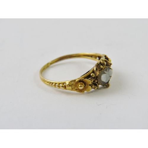 469 - A Georgian yellow gold and banded agate  butterfly seal set ring with within a scrolling, flower car... 