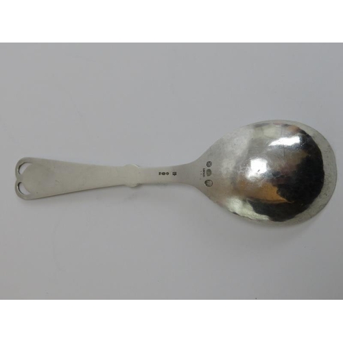 47 - A Georg Jensen Danish sterling silver berry serving spoon. The terminal openwork decorated with a ra... 