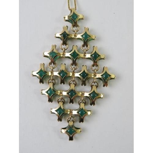 483 - A decorative 9ct yellow gold and jadeite pendant on 18ct yellow gold chain,  pendant length 7.4cm, b... 