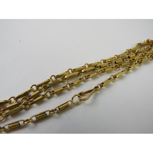 485 - A fancy yellow metal long necklace with stamped 18K, 72cm long,  13.3gms
Condition report: Good