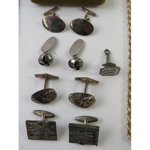 498 - A silver twisted link chain; and other silver and silvery metal items to include cufflinks and a med... 