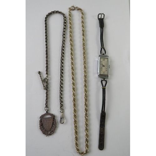 498 - A silver twisted link chain; and other silver and silvery metal items to include cufflinks and a med... 