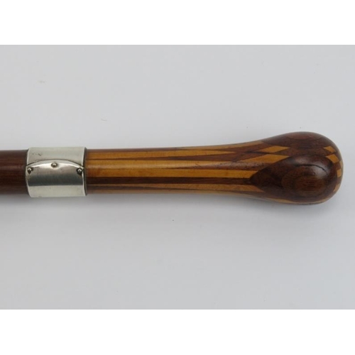 5 - An antique marquetry inlaid walking cane with silver collar. With a marquetry inlaid handle, silver ... 