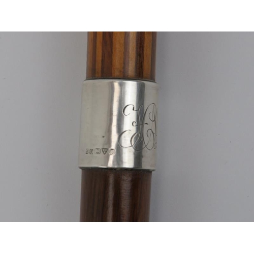 5 - An antique marquetry inlaid walking cane with silver collar. With a marquetry inlaid handle, silver ... 