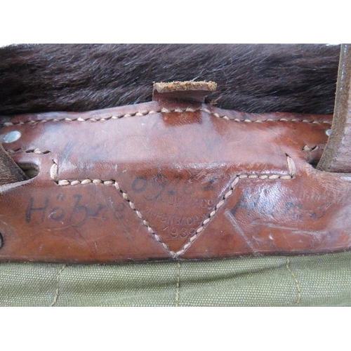 51 - A German WWII Tornister backpack with bearskin fur back. Stamped ‘Gebruder Klinge Dresden 1940’. 42 ... 