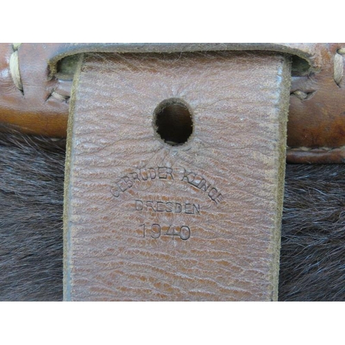 51 - A German WWII Tornister backpack with bearskin fur back. Stamped ‘Gebruder Klinge Dresden 1940’. 42 ... 