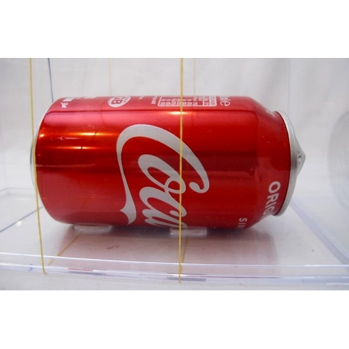 551 - Damien Hirst (British, b.1965) signed Coke Can, displayed in a perspex case.  20cm long.  Provenance... 