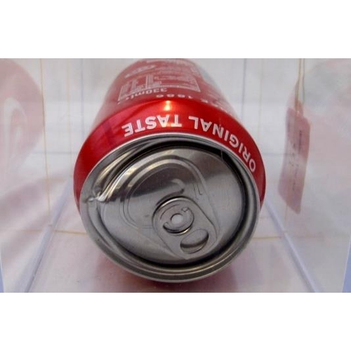 551 - Damien Hirst (British, b.1965) signed Coke Can, displayed in a perspex case.  20cm long.  Provenance... 