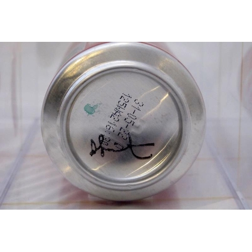 551 - Damien Hirst (British, b.1965) signed Coke Can, displayed in a perspex case.  20cm long.  Provenance... 