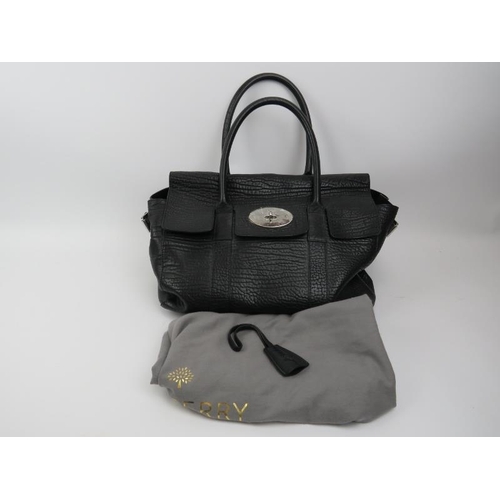 57 - A Mulberry ‘Bayswater’ black heavy grain leather handbag. With silver hardware and original dust bag... 