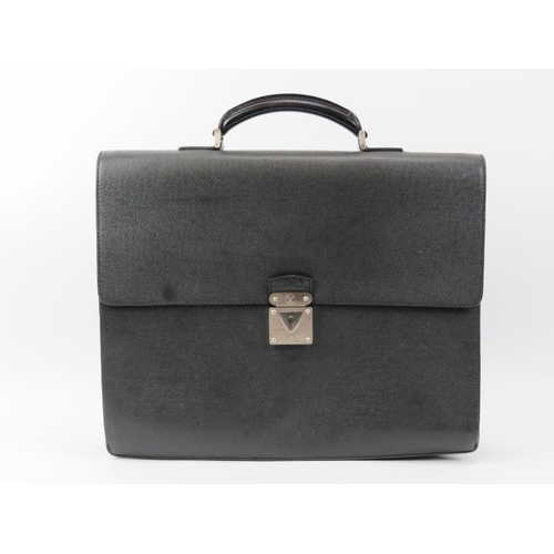 61 - A Louis Vuitton Kourad black leather briefcase. With brushed silver hardware. Code: RI 1006. 42 cm l... 