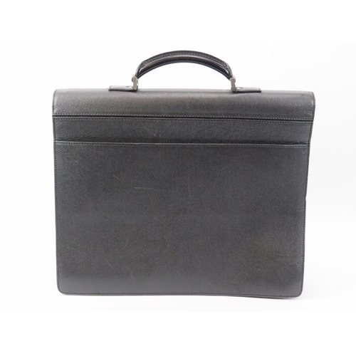 61 - A Louis Vuitton Kourad black leather briefcase. With brushed silver hardware. Code: RI 1006. 42 cm l... 