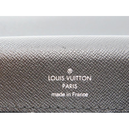 61 - A Louis Vuitton Kourad black leather briefcase. With brushed silver hardware. Code: RI 1006. 42 cm l... 