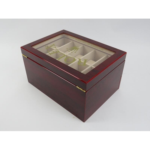 85 - A ‘Rolex Watches of Switzerland’ style presidential watch box. Compartmented for holding twenty watc... 