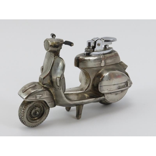 86 - A vintage desktop cast metal lighter modelled as a Vespa P200E scooter, late 20th century. 14.5 cm l... 