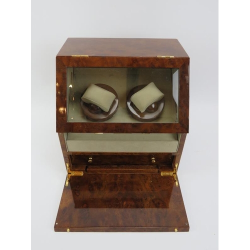 90 - A Hillwood of London simulated burr walnut watch box with two rotating watch winders. Lower internal... 