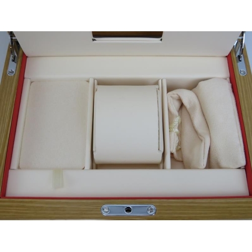 93 - An Omega wristwatch box. With a fitted lined fabric interior and outer card box. Outer box: 11.3 cm ... 