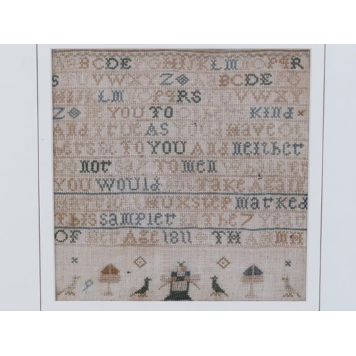 97 - A Georgian children’s needlework sampler, dated 1811. By Harriet Huckstep, seven years of age. Frame... 