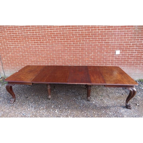 706 - A very large William IV mahogany banqueting table, having four additional leaves, on carved cabriole... 