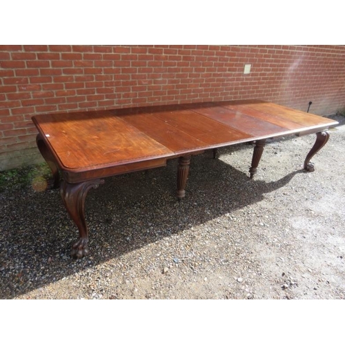 706 - A very large William IV mahogany banqueting table, having four additional leaves, on carved cabriole... 