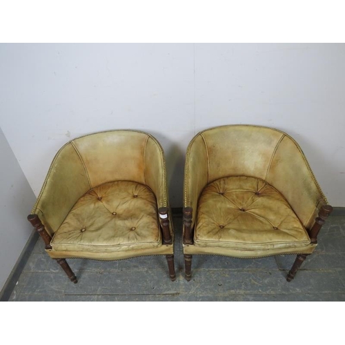 709 - A pair of vintage antique style mahogany tub chairs, upholstered in tan leather with brass studs, on... 