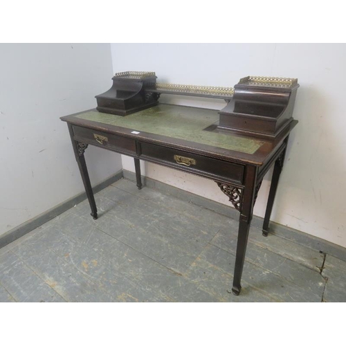 710 - A 19th century Aesthetic Movement ebonised writing desk by S.J. Waring, the upper gallery with open ... 