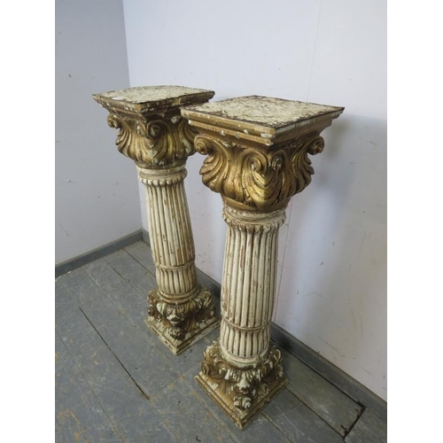 714 - A pair of antique French polychrome fluted columns, having pressed tin tile tops, and scroll carved ... 