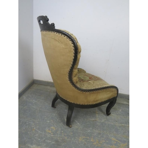 718 - A Napoleon III ebonised spoonback chair, retaining the original profusely buttoned upholstery with b... 