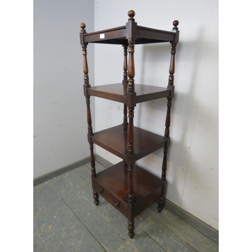 732 - A 19th Century mahogany freestanding four-tier whatnot, having turned ball finials and baluster upri... 