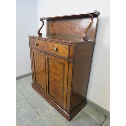 733 - A Regency Period walnut and mahogany crossbanded chiffonier, the upper gallery with pierced brass ra... 