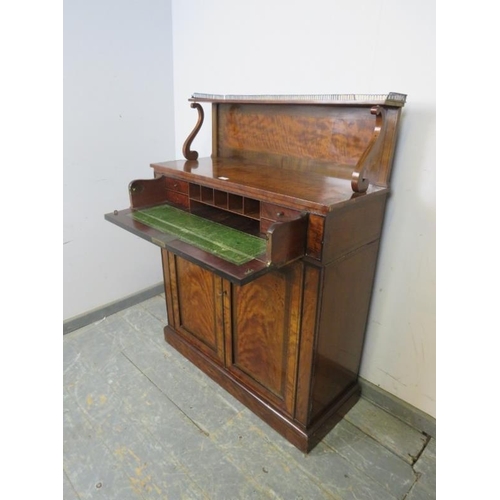 733 - A Regency Period walnut and mahogany crossbanded chiffonier, the upper gallery with pierced brass ra... 