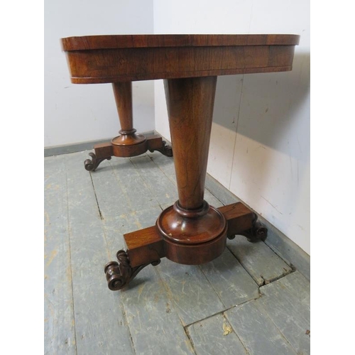 734 - A William IV rosewood library table, the tapering plain supports terminating on scrolled feet with e... 