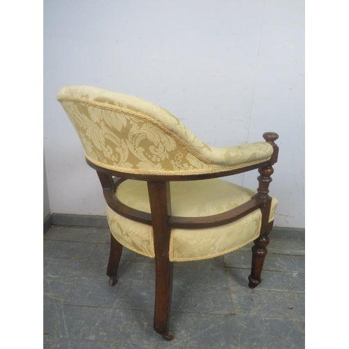 738 - A 19th Century mahogany tub chair, having turned uprights with bun finials, reupholstered in a good ... 