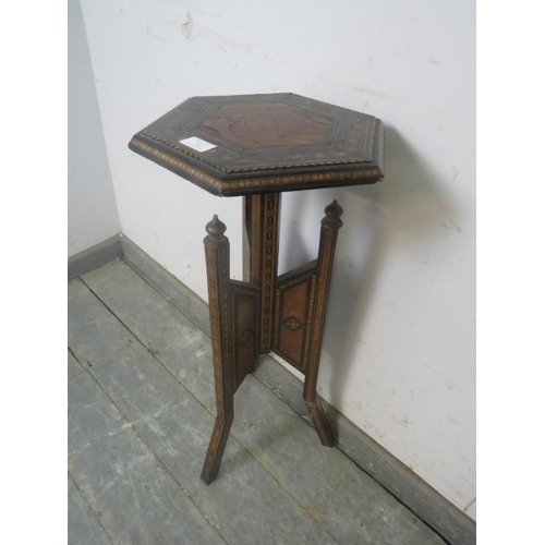 742 - A Vintage hexagonal plantstand in the Moorish taste, having inset leather top and profuse marquetry ... 