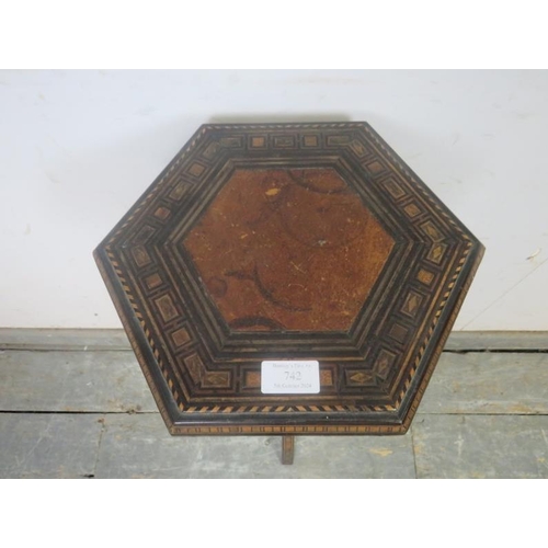 742 - A Vintage hexagonal plantstand in the Moorish taste, having inset leather top and profuse marquetry ... 