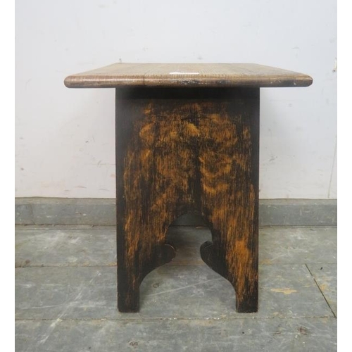 743 - A small Arts and Crafts period golden oak occasional table, having Moorish arch decoration to legs, ... 