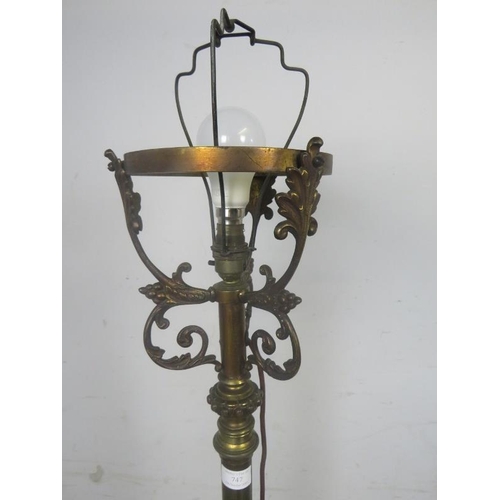 747 - An ornate Victorian gilt brass height adjustable standard lamp, having pierced acanthus leaf decorat... 