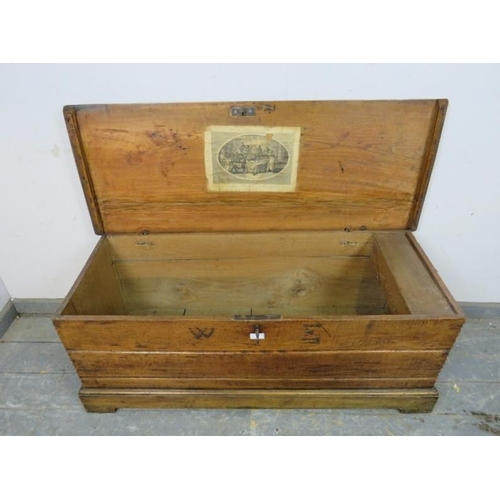 750 - A 19th century oak flat topped trunk of good colour, having internal candle box and retaining the or... 