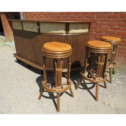 753 - A mid-century teak and bamboo corner bar, having open shelving, one short drawer and drinks cabinet ... 