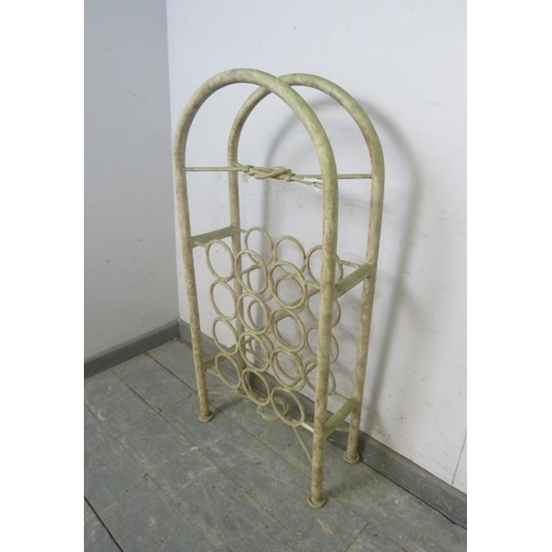 754 - A vintage industrial freestanding metal wine rack, painted and distressed.  Holds 12 bottles.  H100c... 