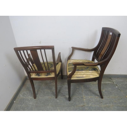 770 - A pair of antique his & hers Sheraton Revival rosewood elbow chairs, the backsplats with Classical m... 