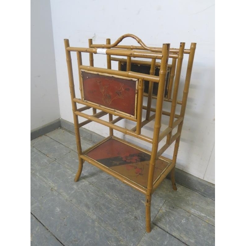 782 - A turn of the century bamboo magazine rack, having hand-painted Chinoiserie panels to both sides and... 