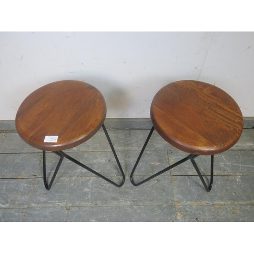 789 - A pair of good quality contemporary stools by Jaques England, the circular walnut seats on canted ha... 