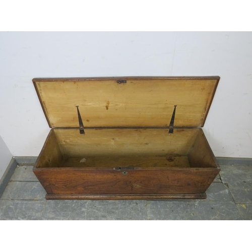 803 - A 19th century elm flat topped trunk of good colour, on stile supports. 
H43cm W106cm D36cm (approx)... 