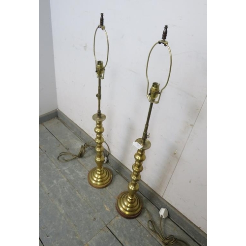 805 - A pair of large vintage brass height adjustable table lamps, on wooden plinth bases. 
H98cm Diameter... 